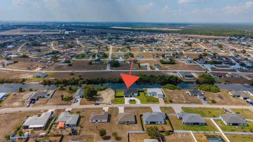 View of property location featuring nearby suburban area
