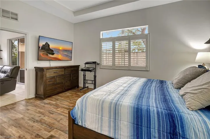 Bedroom with light wood-type flooring
