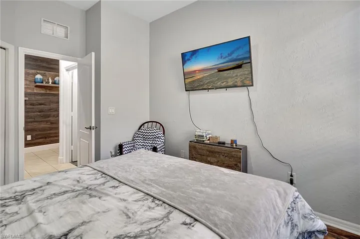 Bedroom featuring light tile patterned floors