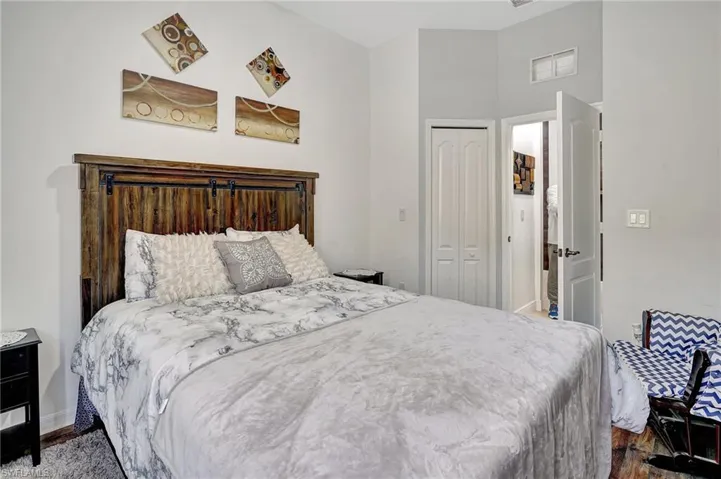 Bedroom featuring a closet and hardwood / wood-style floors