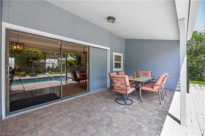 View of patio / terrace featuring outdoor dining area and fence