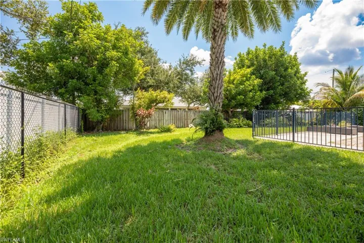 View of yard with a patio and a fenced backyard