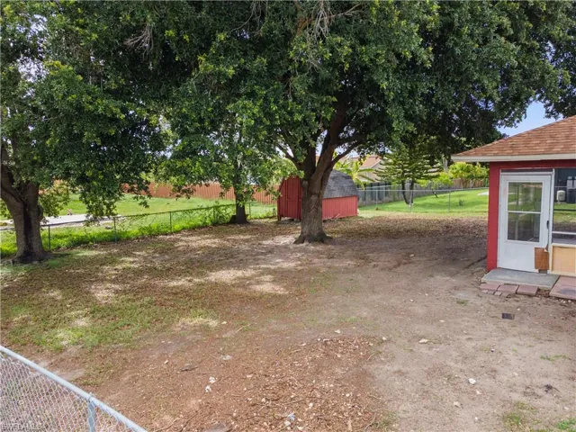 View of fenced backyard