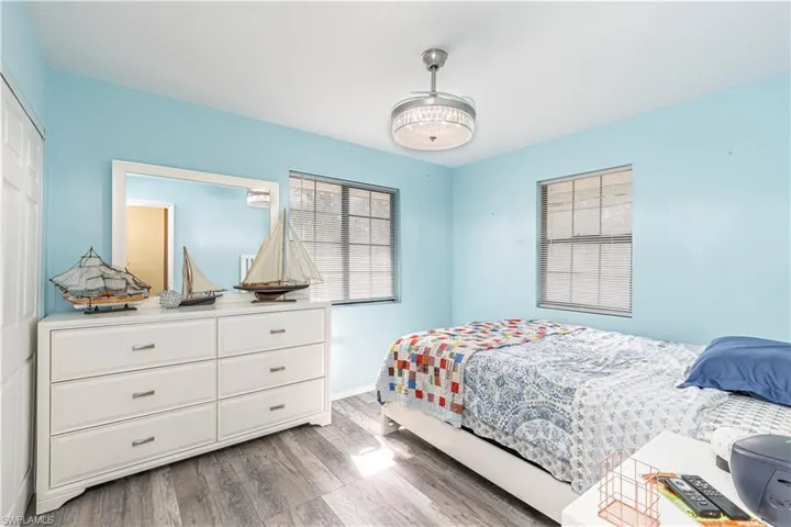 Bedroom featuring wood-type flooring