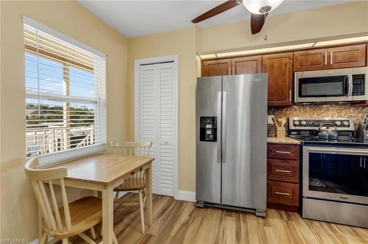 Windowed eat in kitchen.