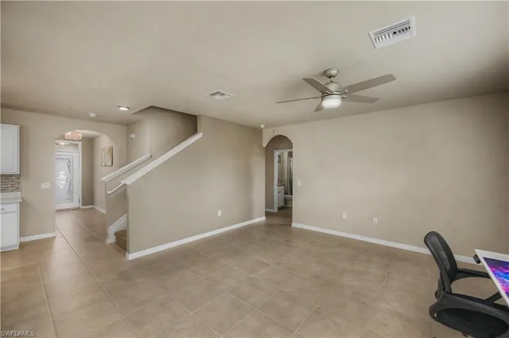 another view from the living room from the sliding glass doors looking toward the front of house.