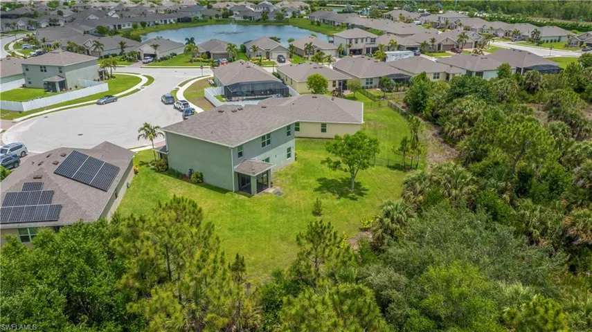 The back of the home you see the natural preserves & home on a quiet culdesac close to back gate!