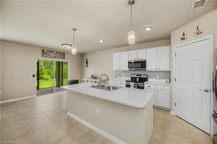 Open concept-where kitchen, dining & living room all meet.