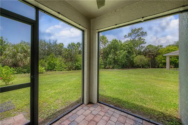 Sreened in Lanai to enjoy privacy & serenity in oversized back yard!