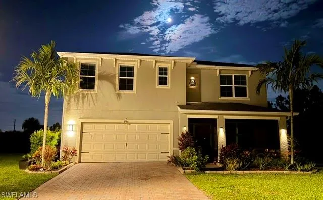Night time photo showing the beauty of the outdoor lighting.