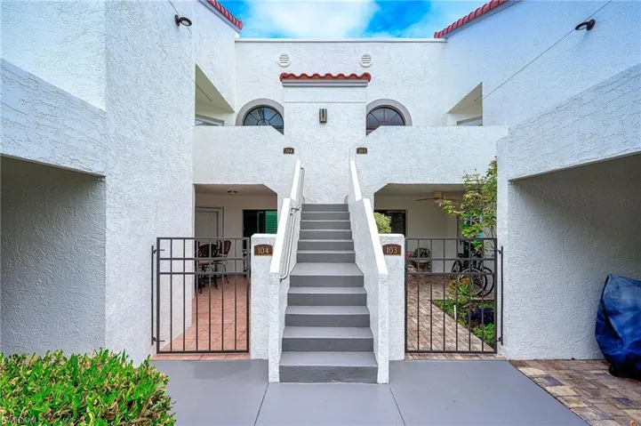 Property entrance with covered porch
