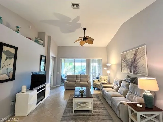 Great Room-Spacious & Bright with Soaring Ceiling, tile floor and open to kitchen & Dining area
