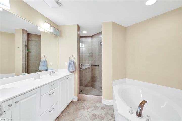 Walk in Shower with Glass Dorr and Soaking Tub