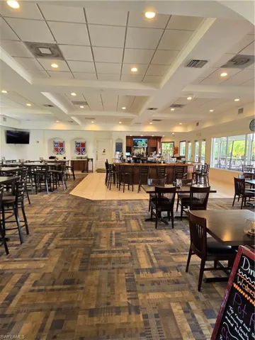 View of carpeted dining space