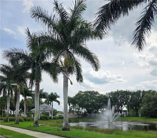 View of community with a water view