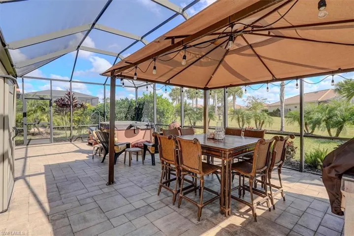 Sunroom with vaulted ceiling