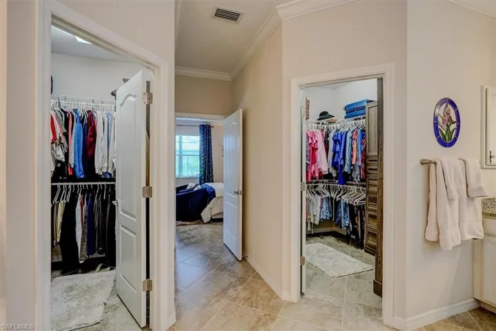Bathroom featuring crown molding