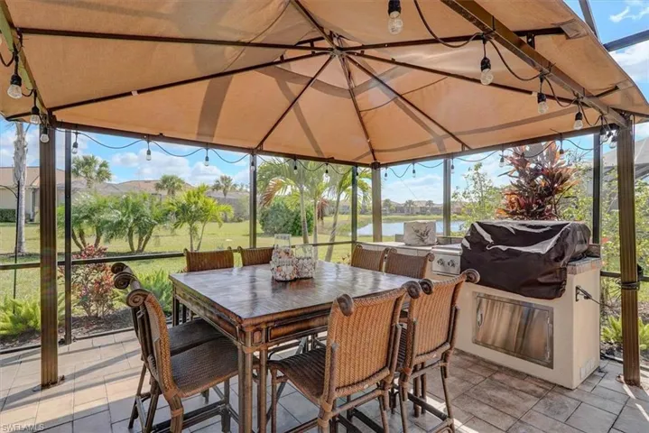 Sunroom with a water view