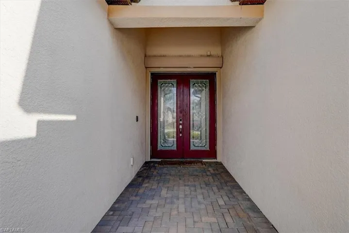 Property entrance with french doors