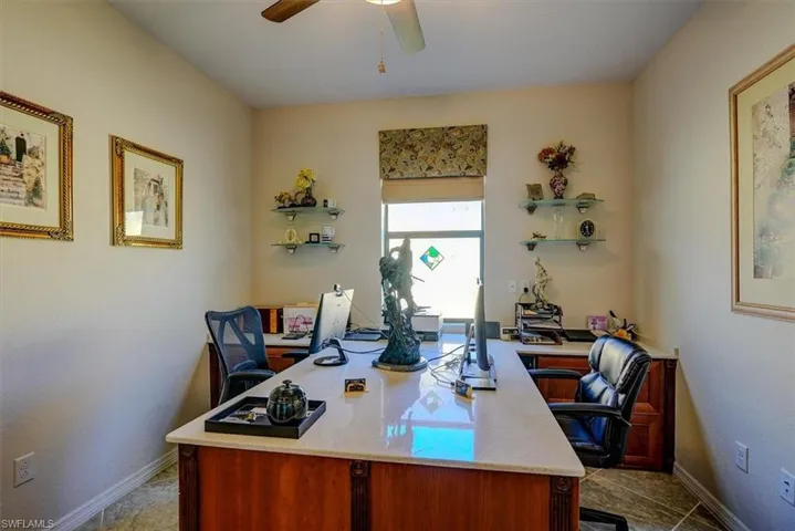 Home office featuring ceiling fan