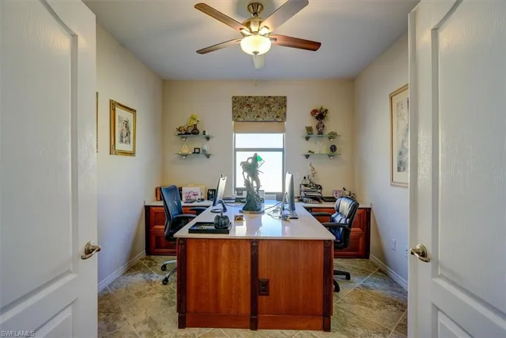 Office space featuring ceiling fan