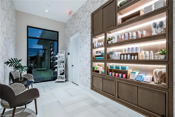 Hallway with light tile patterned floors