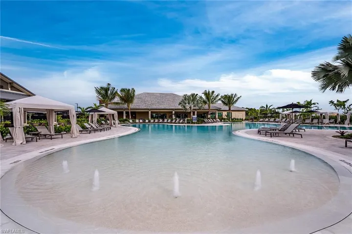 View of pool with a gazebo, a patio area, and pool water feature