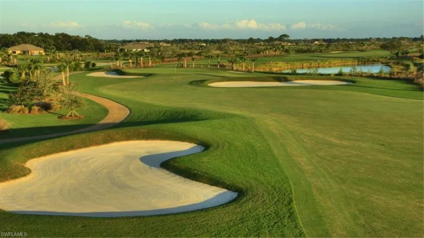View of home's community with a water view and view of golf course