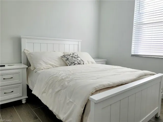 Bedroom featuring wood finish floors