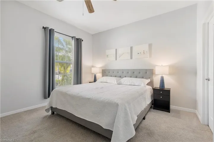 with adjoining bath and walk in closet