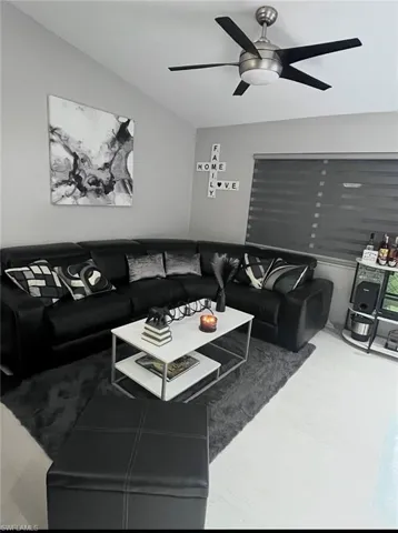 Vaulted ceiling with contemporary ceiling fan fixture