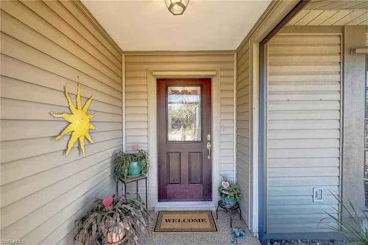 Property entrance featuring a porch