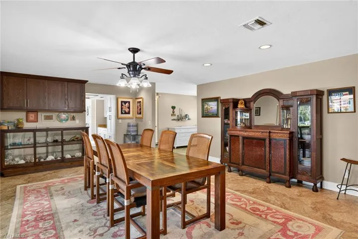 Dining area featuring recessed lighting and a ceiling fan