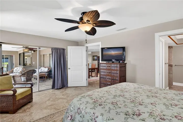 Bedroom featuring a closet and ceiling fan