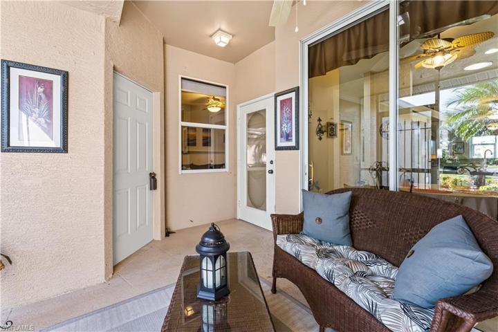 This is your front lanai  which is 1 or 2 lanais to relax with your morning coffee!  The door to your left is the entry into your 1 car garage.