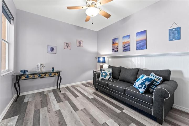 2nd bedroom has a shiplap wall. LVP waterproof flooring.