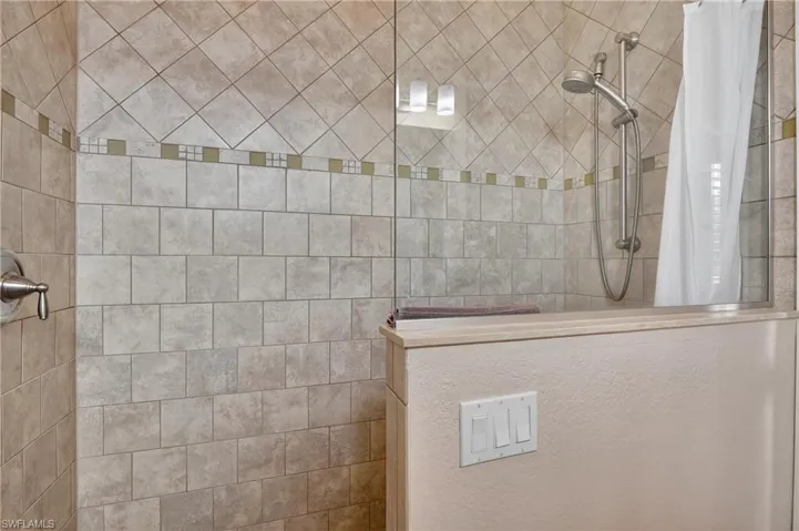 Bathroom featuring walk in shower