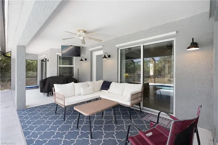 View of patio / terrace featuring ceiling fan and an outdoor living space