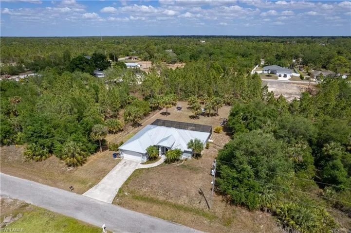 Drone / aerial view with a forest view