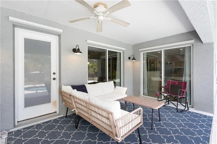 View of patio / terrace featuring ceiling fan and an outdoor hangout area
