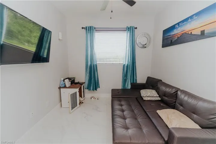 Dining room being used as a DEN.