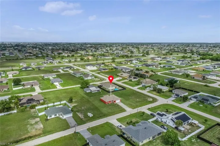 View of property location featuring nearby suburban area