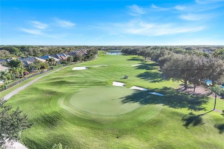 Aerial overview of property's location in Escala Neighborhood featuring a golf course