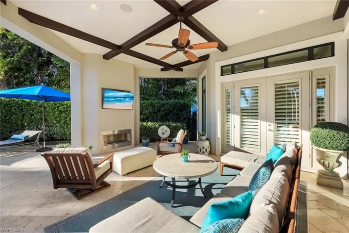 View of patio / terrace with ceiling fan, area for grilling, and outdoor dining space