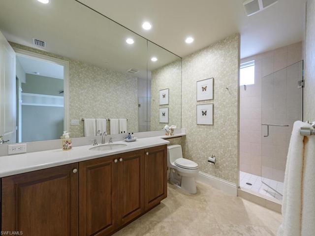 Private en-suite bathroom off the guest room with walk-in shower.