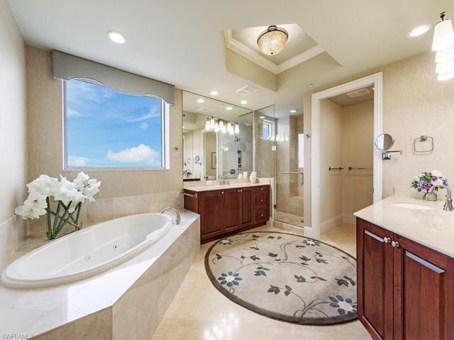 Your master bathroom is complete with soaking jacuzzi tub, separate his/her vanities and walk in shower.
