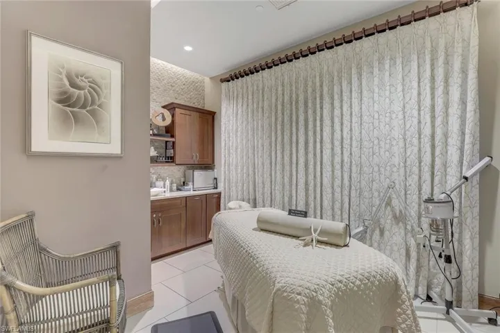 Bedroom with light tile patterned floors