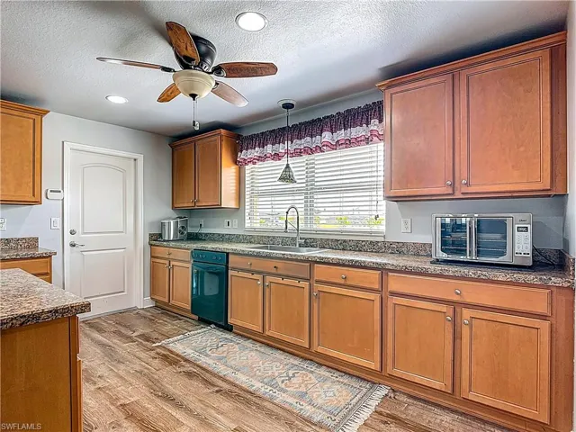 The doorway leads to garage....