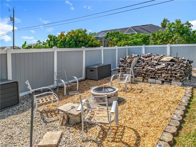 Fire Pit Gathering area with plenty of firewood!