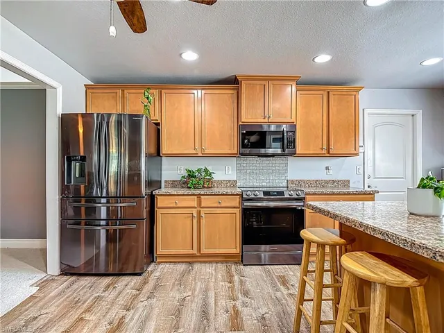 All gleaming black appliances replaced in 2023